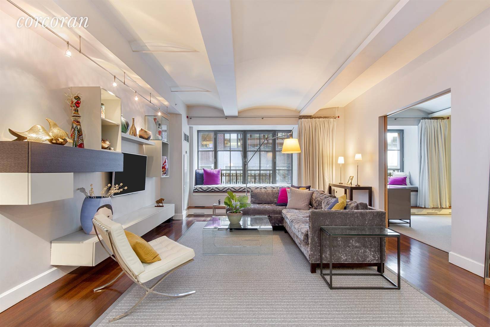 SIGNED LEASE. Located across the street from Lincoln Center in an exquisite building designed by Costas Kondylis, this 1688 sq ft mint condo loft has high end finishes and is ...