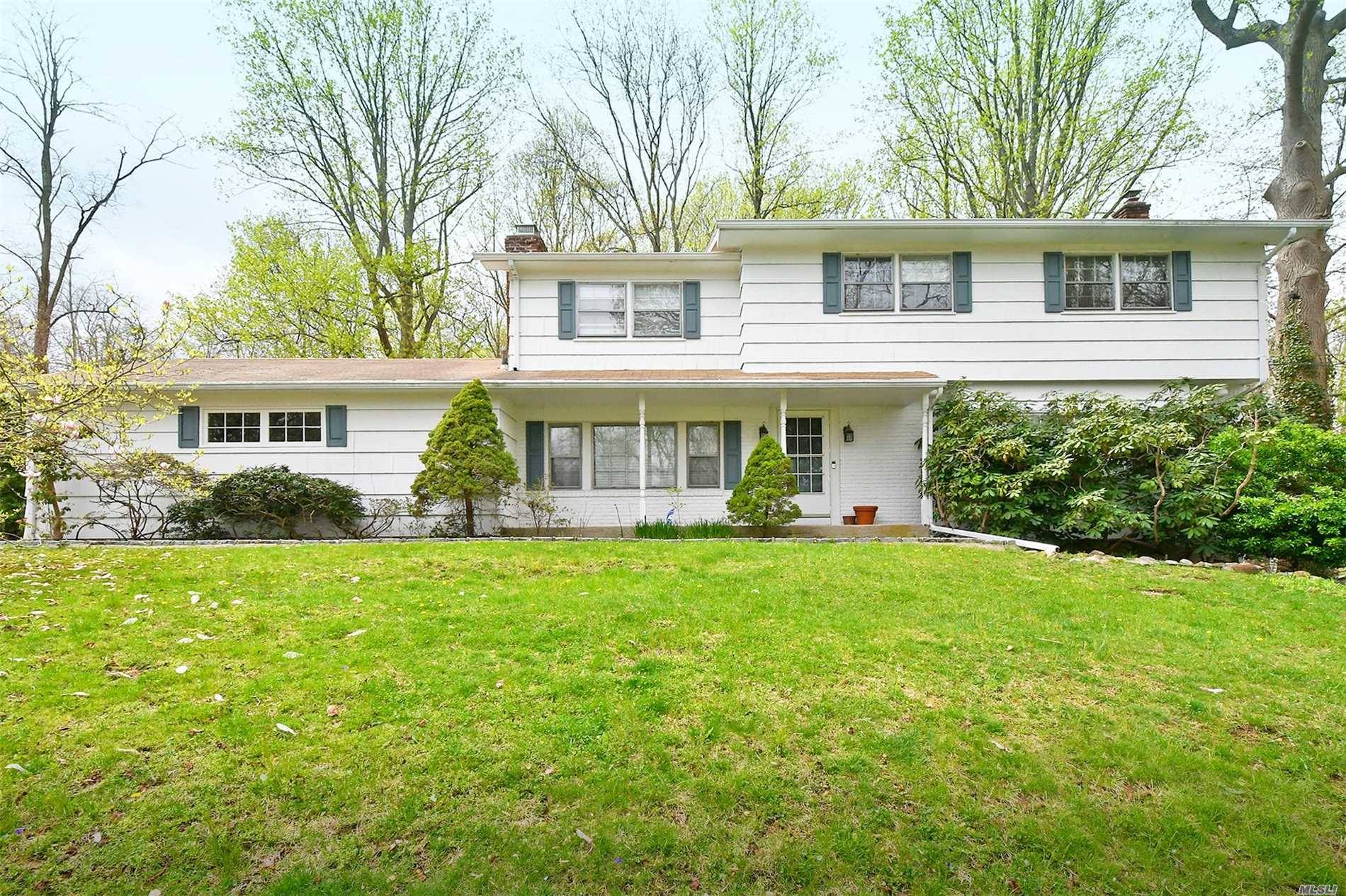 Great opportunity to live on North Dix Hills acre !