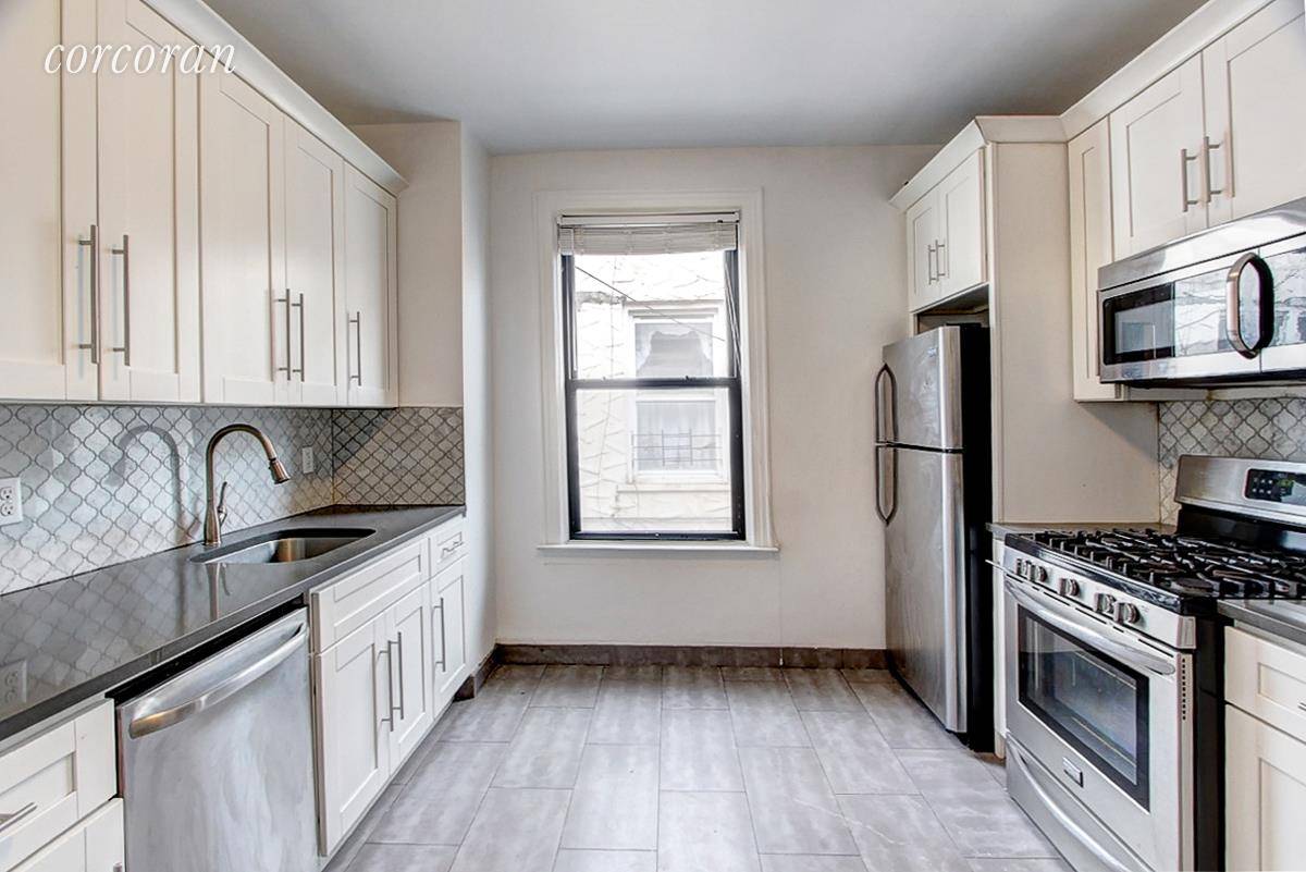 98 17 32nd Avenue is a multifamily townhouse with parking located in East Elmhurst.