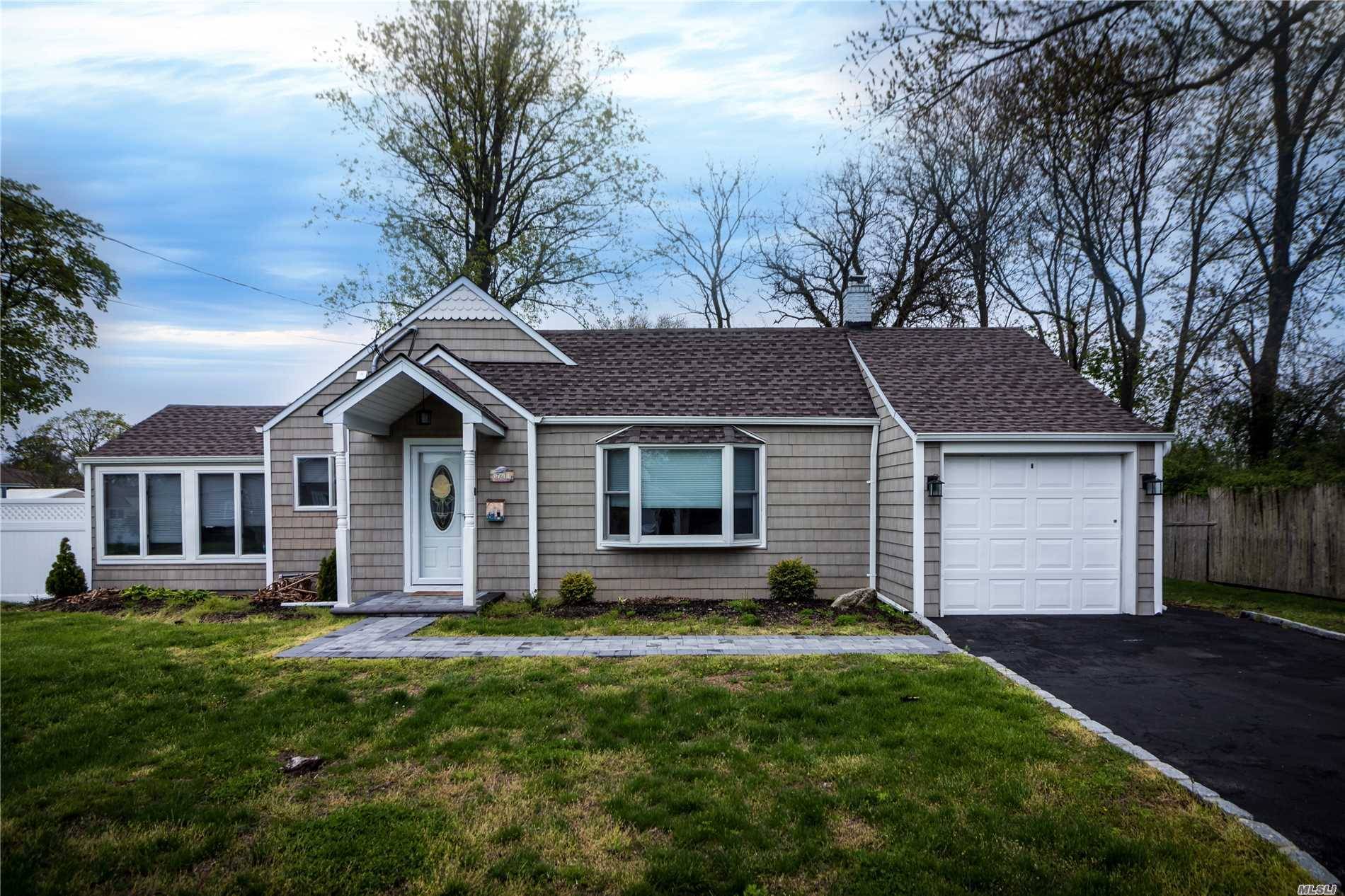 OPEN CONCEPT FLOOR PLAN This South Of Montauk Expanded Ranch Has Been Renovated W New Kitchen W Granite SS Appliances, Living Room W Fireplace, Dining Room, Den, Mstr Suite W ...