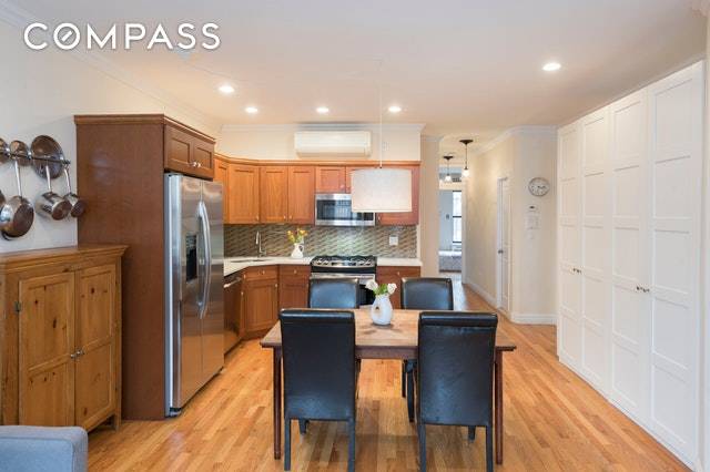 This gracious 2 bedroom plus duplex with private garden in a turn of the century Park Slope townhouse is the perfect place to call home.