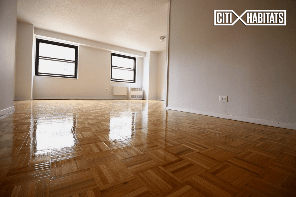 This newly renovated 2 bedroom apartment is situated on a high floor of a 24 Hour Doorman Building with garage, laundry, bike storage, and a mezzanine.