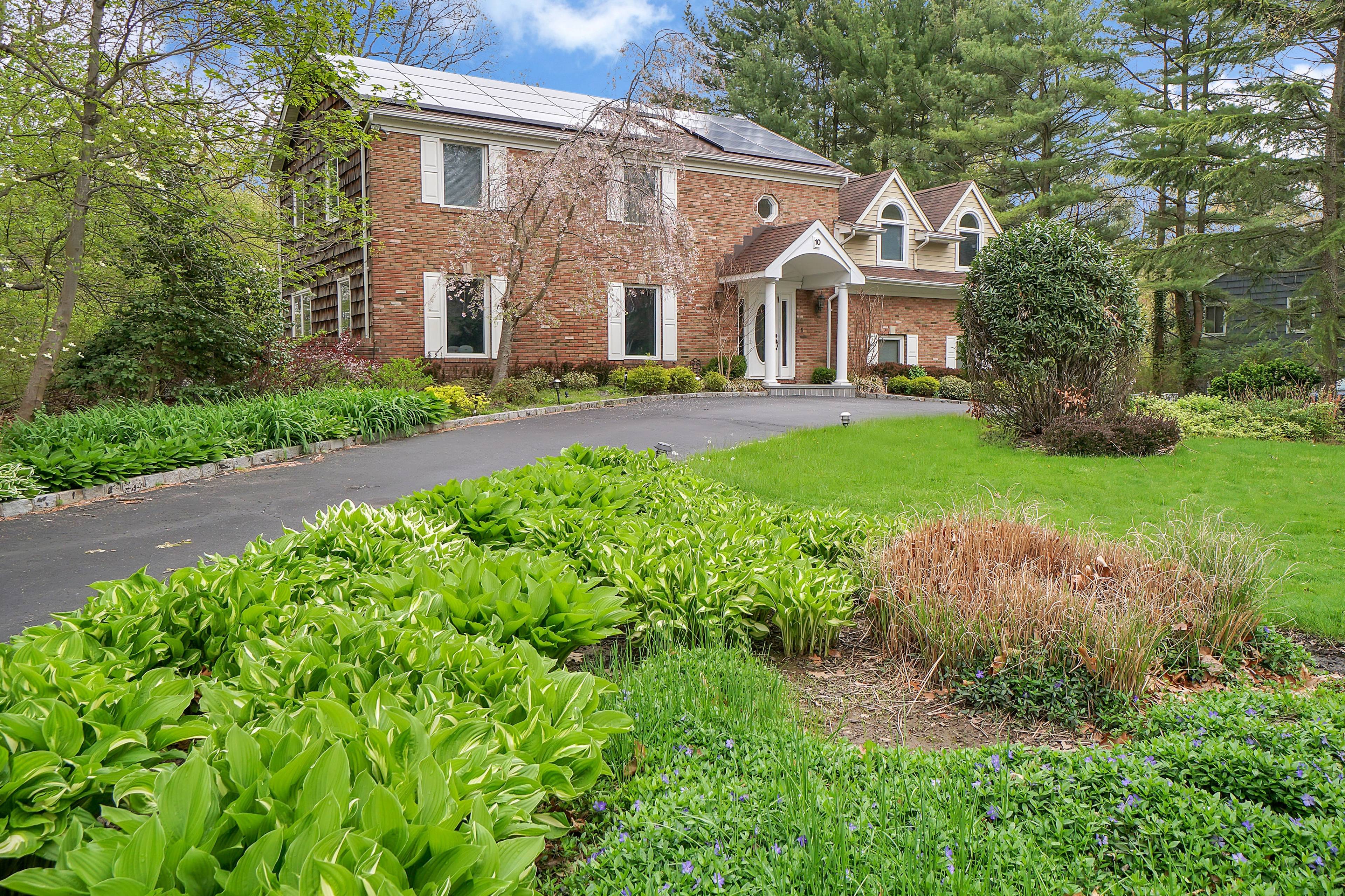 Dix Hills - Beautifully Expanded Valbrook Colonial in Strathmore Hills.