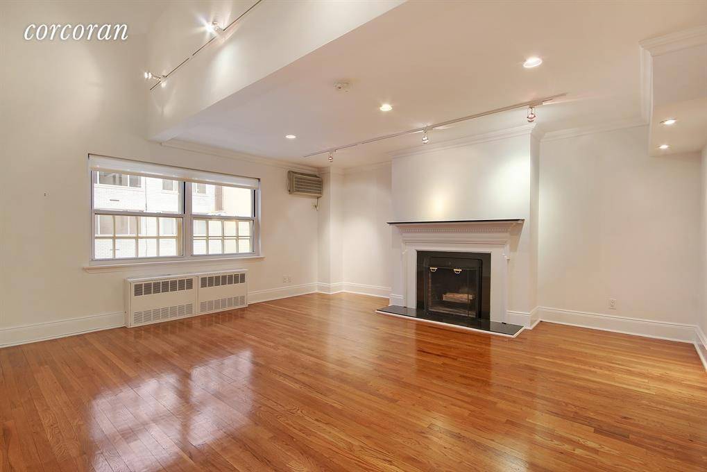 Bright, sunny and spacious 2 bedrooms, 2 baths Duplex apartment in luxury elevator townhouse half block from Central Park in one of Manhattan's most desirable neighborhoods.