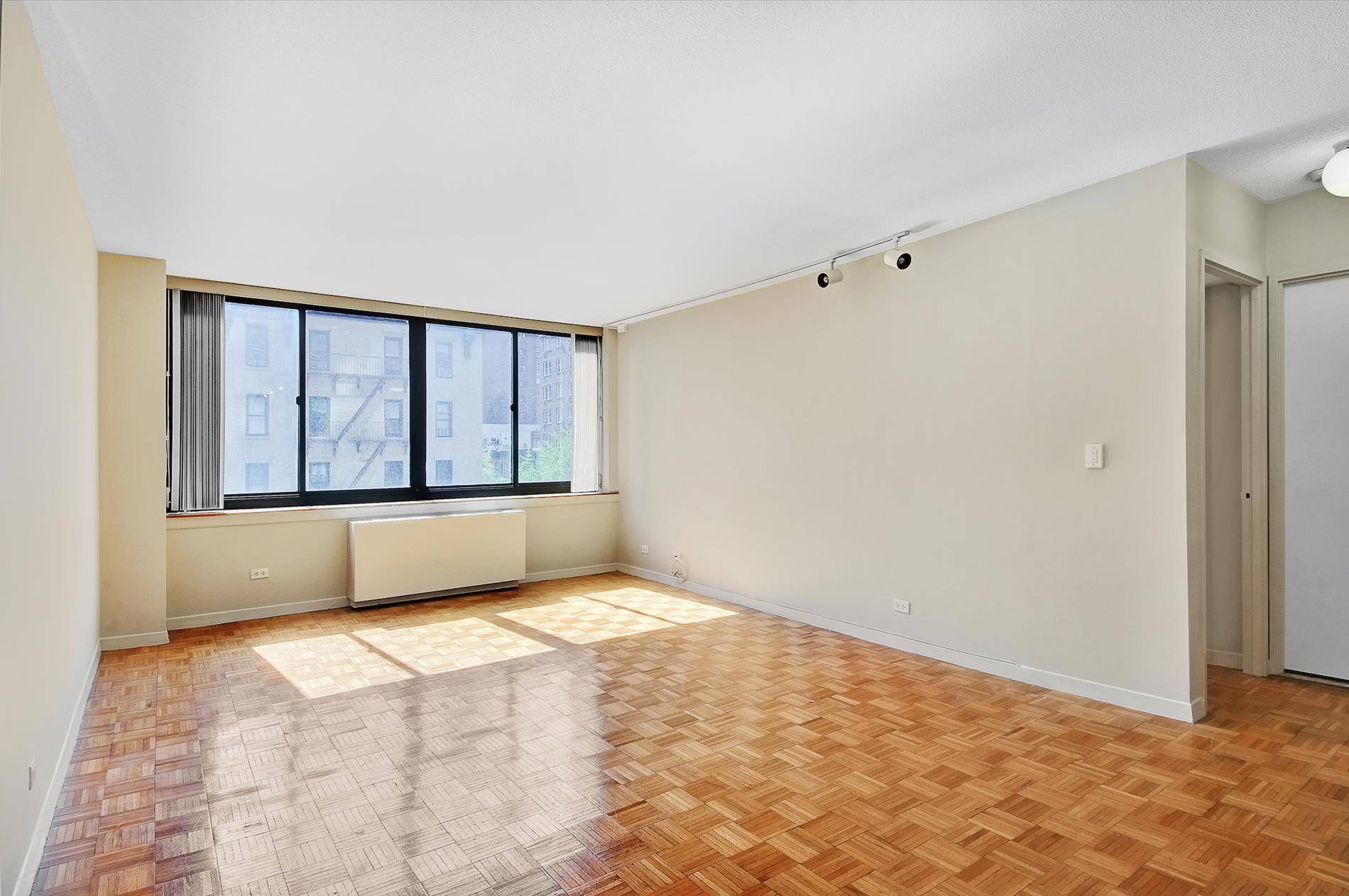 Welcome home to a large, East facing, One or Flex 2 Bedroom apartment located in the Bentley Condominium, a premier full service building located in Kips Bay.