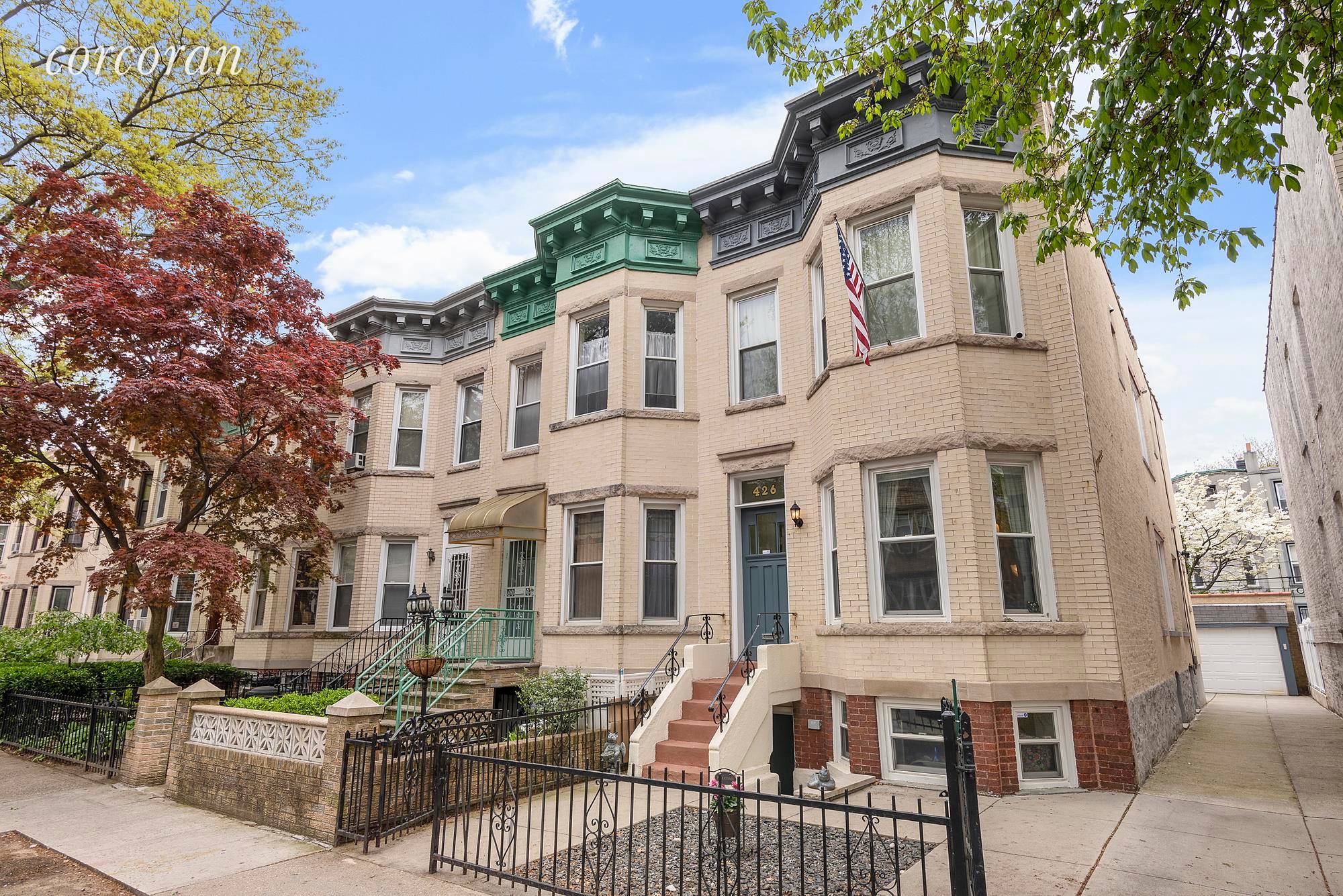 Perfectly located and rarely available renovated semi attached Bay Ridge barrel front townhouse with three exposures, a private driveway, a two car garage and driveway that can accommodate 2 additional ...