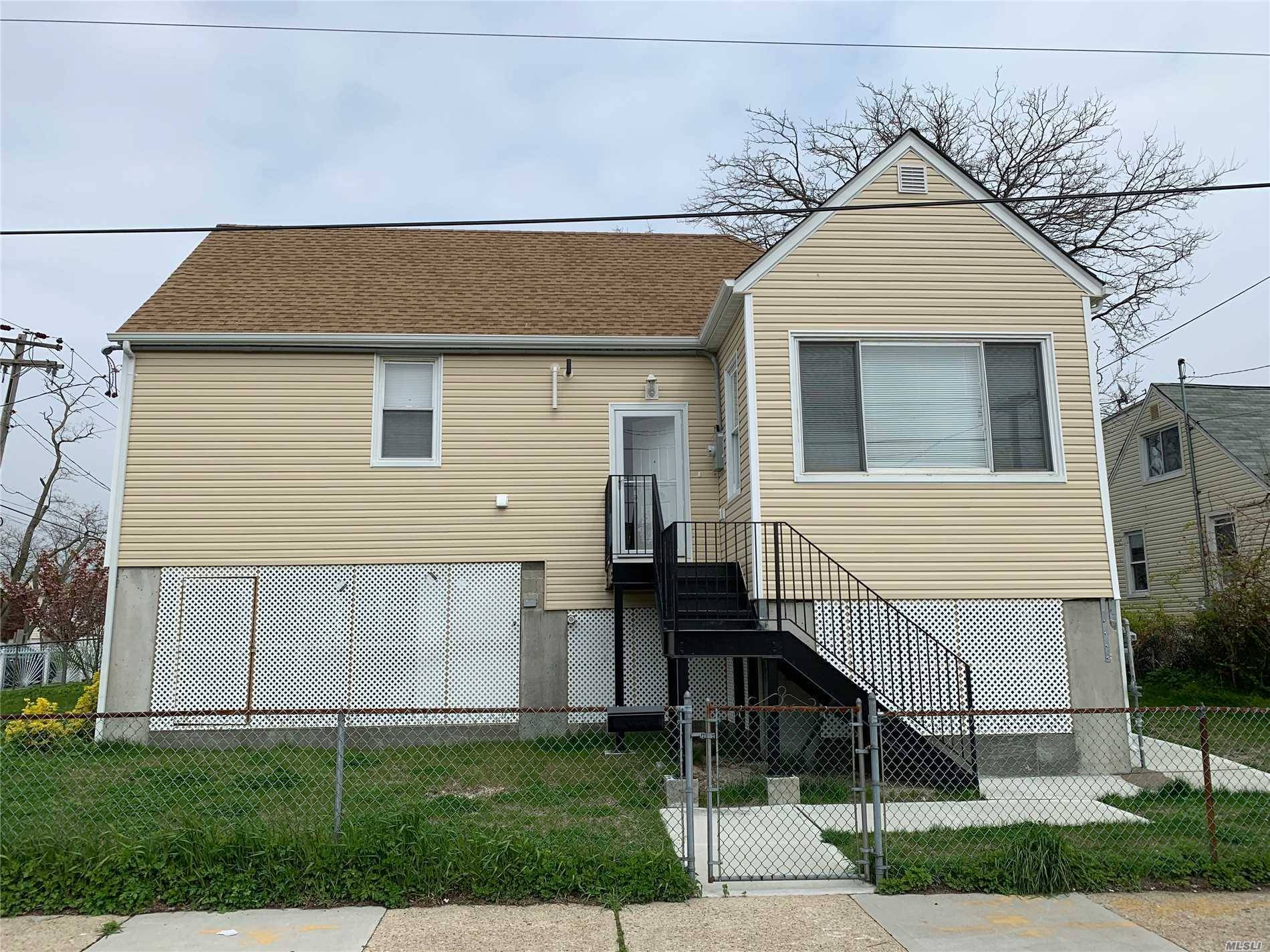 This detached 1 family home is located in the Arverne section of Rockaway, across from Jamaica Bay w water view !