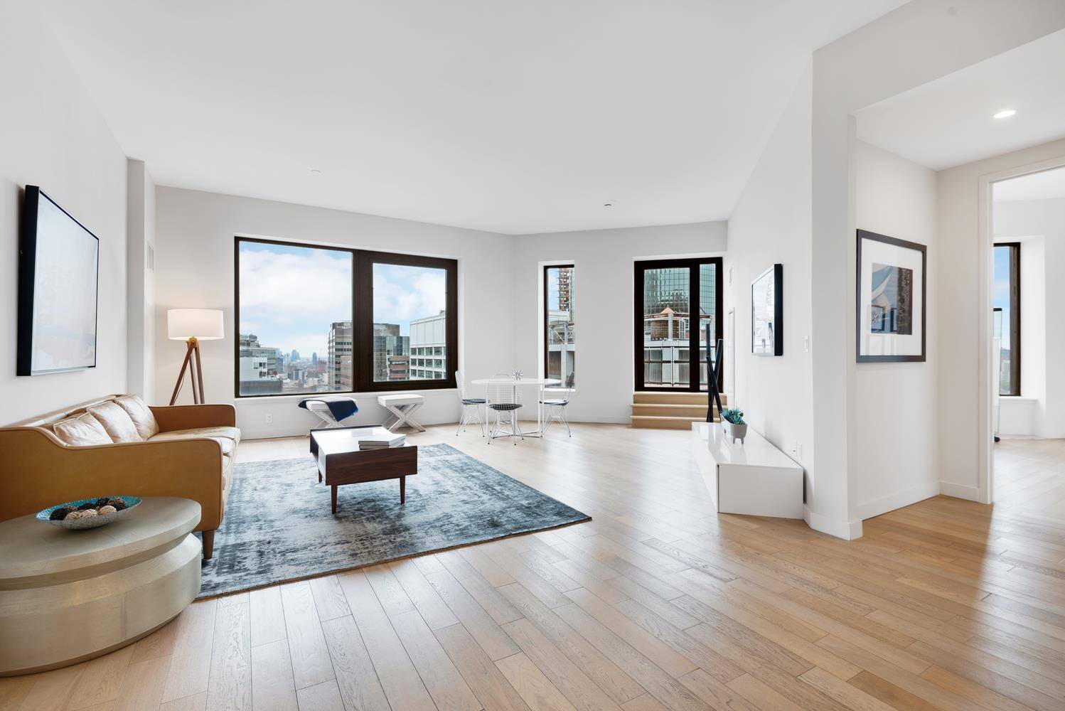 This spectacular 3 bedroom 3 bathroom corner unit with alcove home office and 118 SQ FT private terrace offers walls of windows and unobstructed Northeastern views high above the New ...