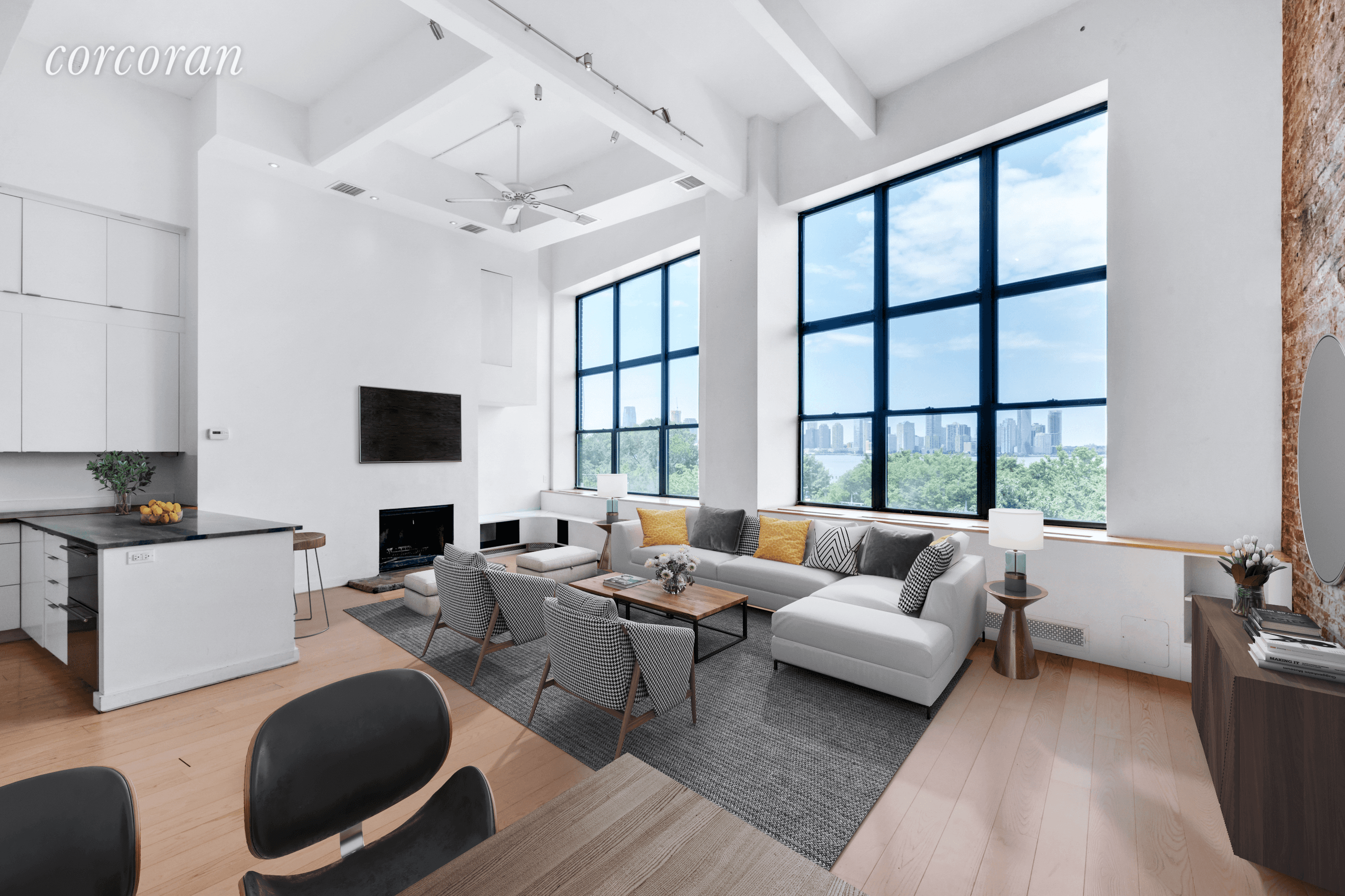 This oversized West Village pre war loft with spectacular Hudson River views features enormous west facing windows, 15 foot ceilings and an abundance of living space and beautiful exposed brick.