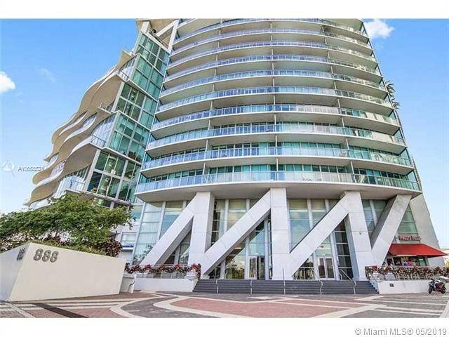 SPECTACULAR UNIT AT MARINA BLUE WITH DIRECT WATER VIEWS