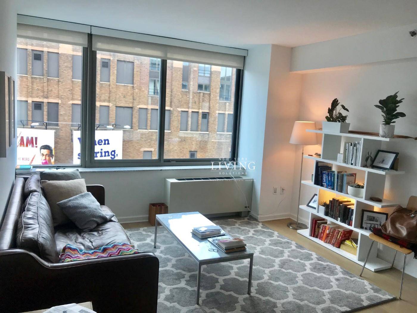 Spacious one bedroom one bath plus dining alcove apartment facing South featuring partial river views in the heart of Chelsea, steps from the Highline and Chelsea Water Park.