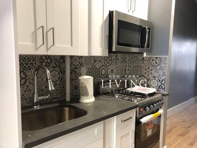 Stunning and Pristine 2 bedrooms 2 tiled bathroom New kitchen new appliances high ceilings new building a block away from transportation conveniently next to all UTILITIES NOT INCLUDED call steve ...