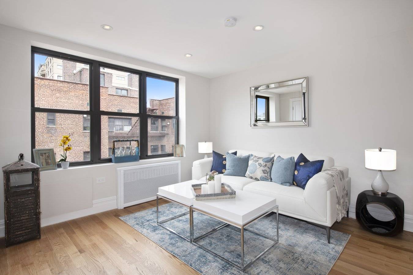 Modern, gut renovated one bedroom, one bath apartment featuring new oak hardwood floors, a spacious living room, large walk in closet or home office, open kitchen with Quartz counter tops, ...