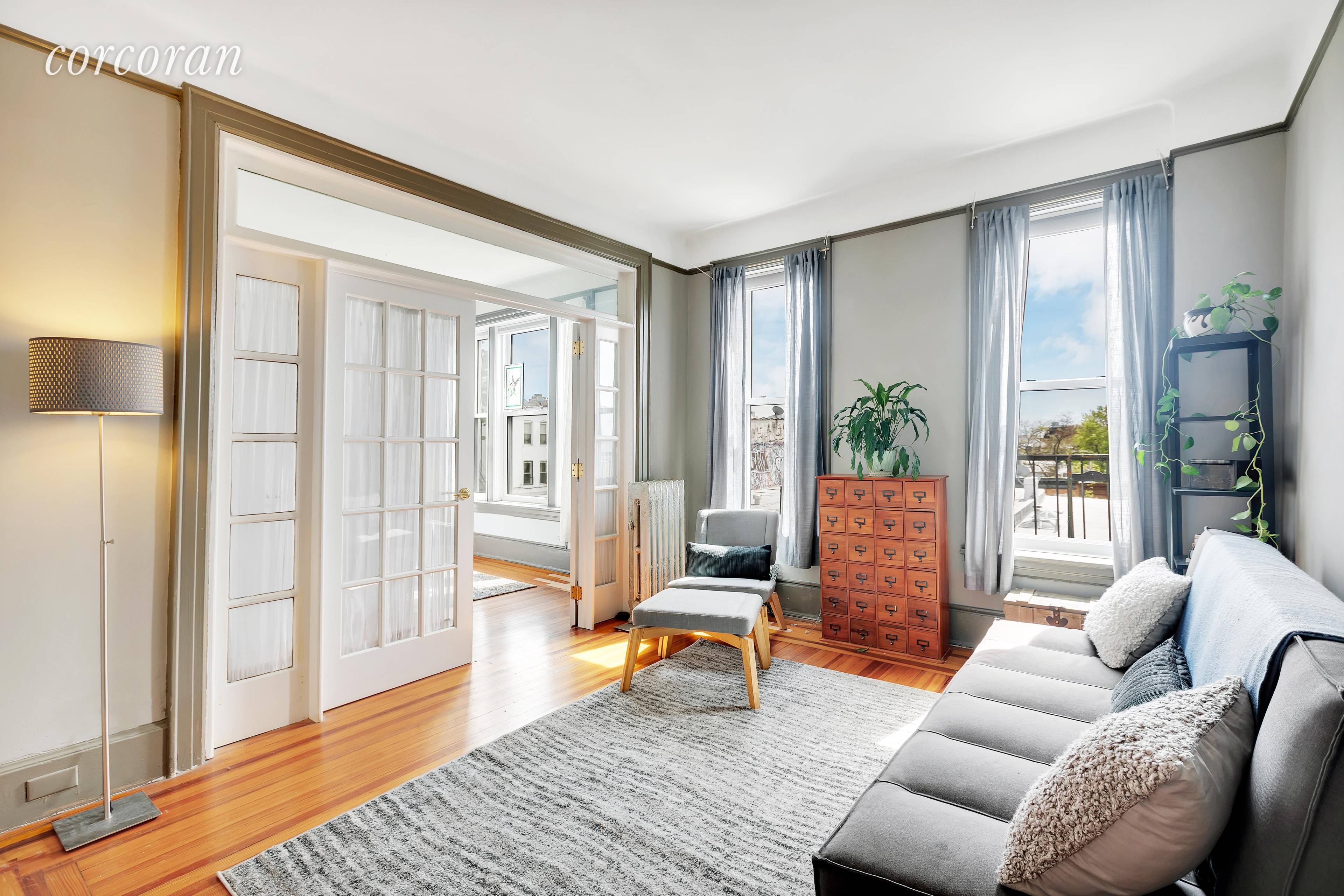 Welcome home to this sun drenched charming 2 bedroom coop apartment on one of the prettiest blocks in Sunset Park Brooklyn.