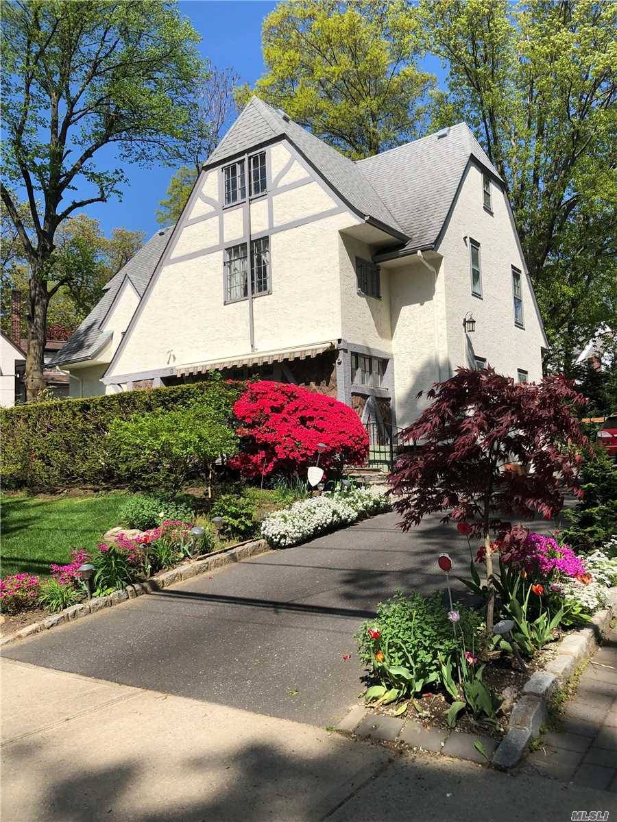 Charming Tudor in exclusive Belgrave Square, Huge 2 story formal livingroom w fireplace stained glass window floor to ceiling windows, renovated kitch, Hardwood Floors, Full walk up attic, full basement, ...