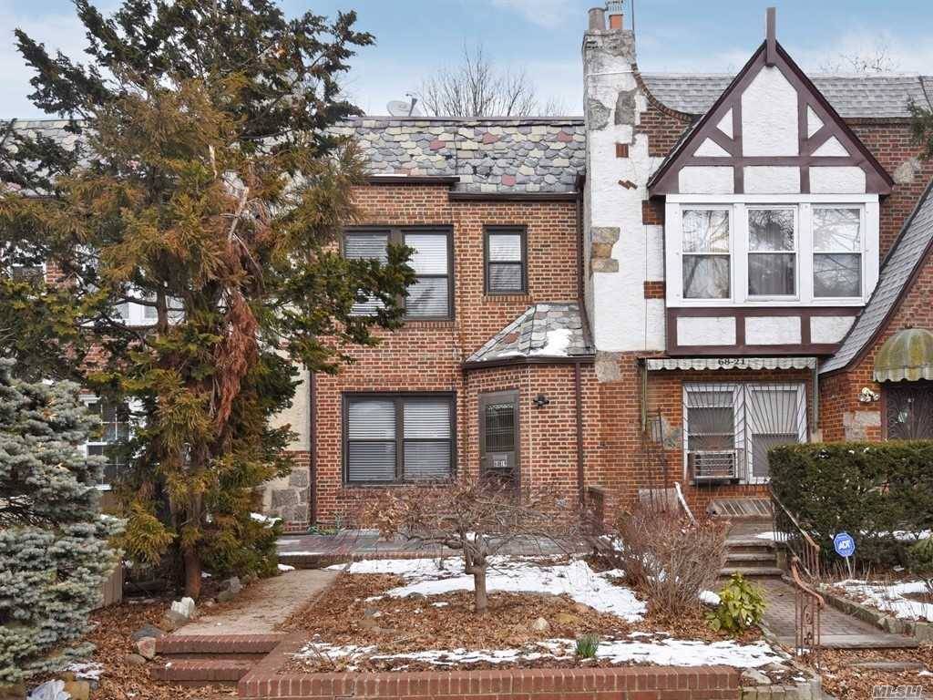 Single Family brick townhouse in Forest Hills.