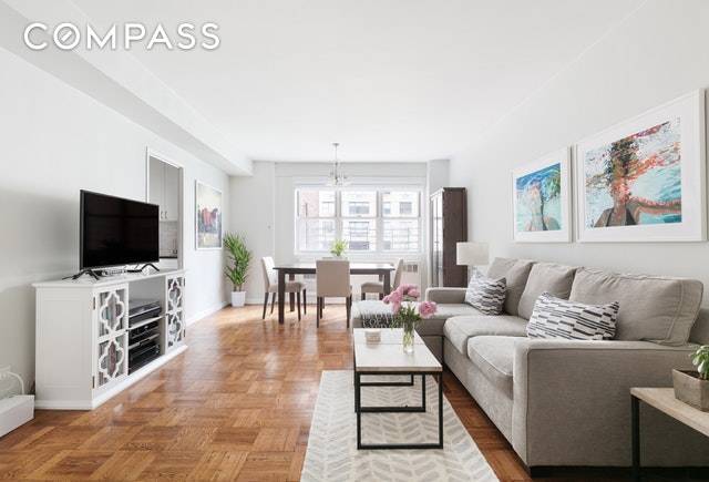 Welcome home to this spacious and cozy 1 bedroom 1 bath apartment in Manhattan s prestigious coop, the Coliseum building located just steps away from Columbus Circle and Central Park.