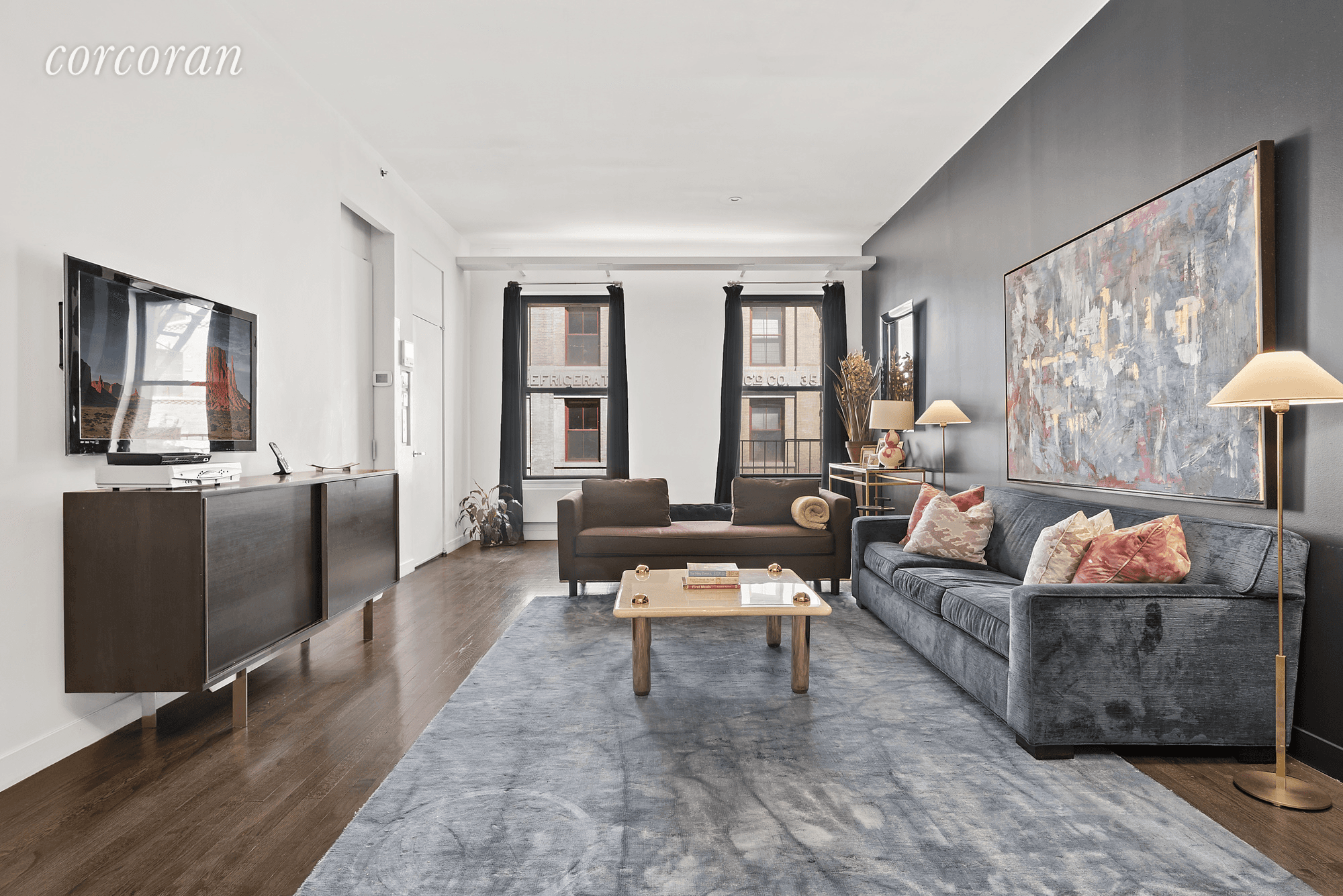 Classic loft living on one of Tribeca's best streets is yours in this two bedroom plus bonus room in a boutique co op.