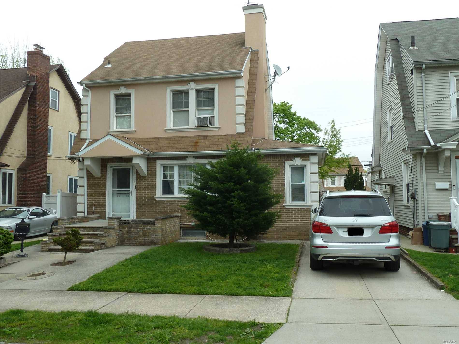 2 Family House Situated In The Heart Of Flushing.