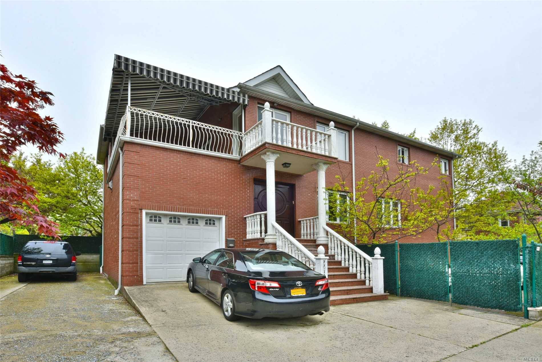 One of a kind, large brick 1 family house located in the desirable Forest Hills area.