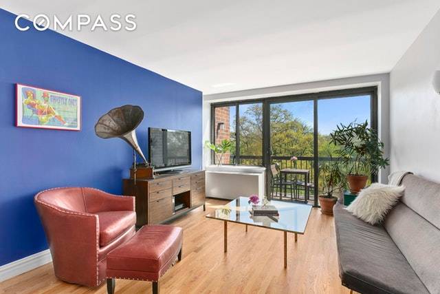 A two bedroom condo with a terrace featuring breathtaking views of Prospect Park and a deeded parking spot.