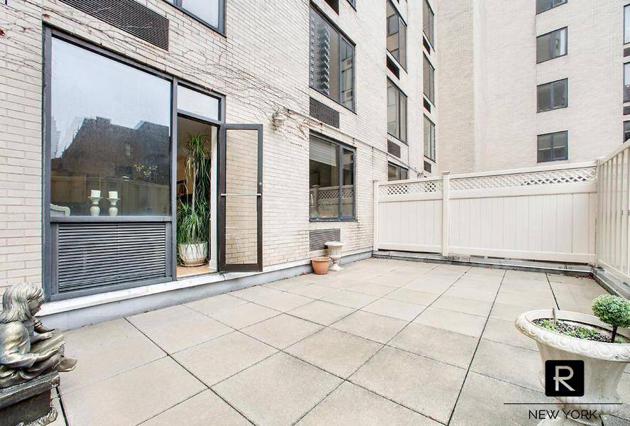 Beautiful 1 bedroom Upper East Side apartment with a huge private fenced patio in a full service pet friendly condo at 85th off Lexington Avenue.