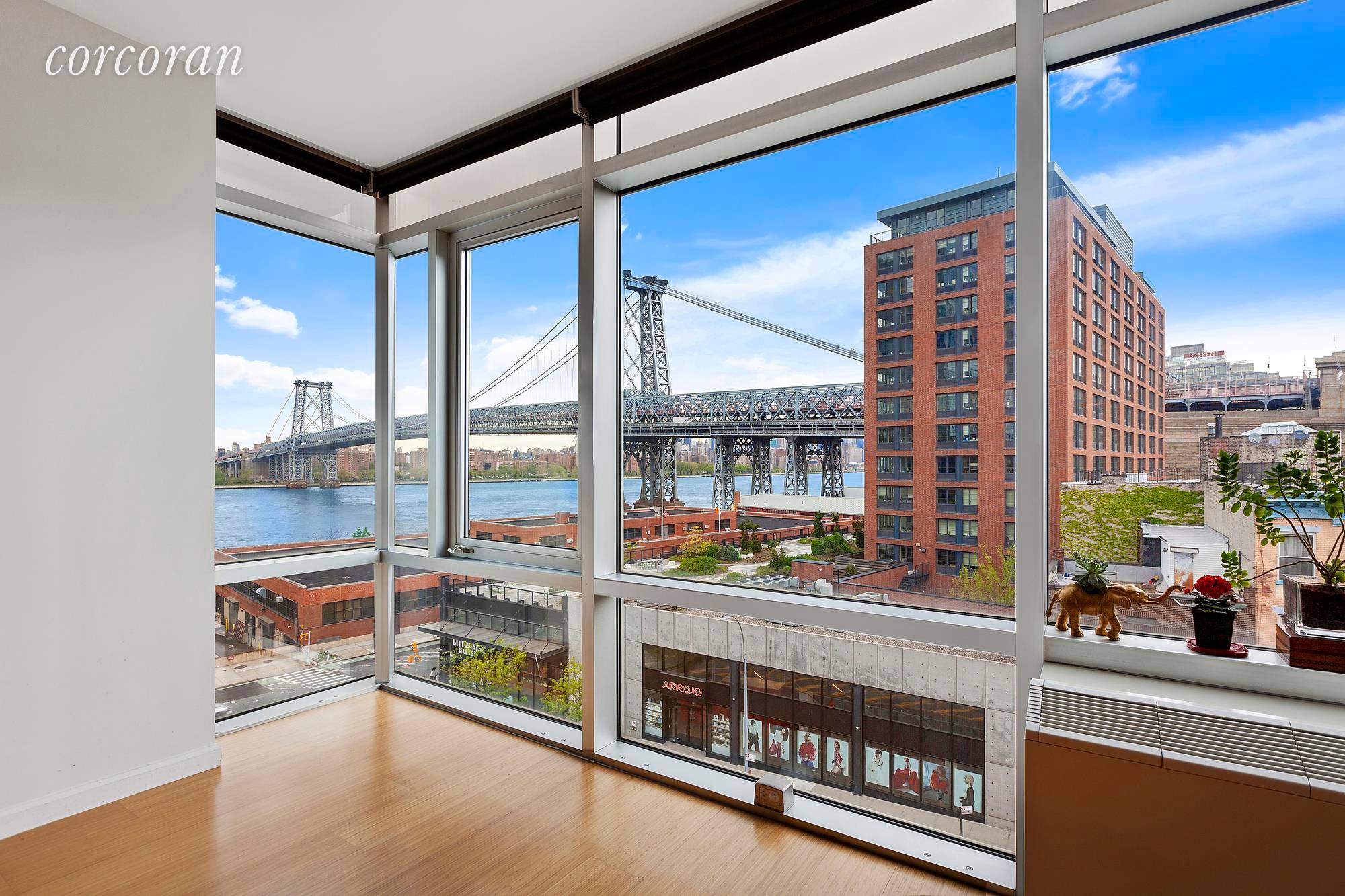 Welcome home to this high floor Designer 2 bedroom, 2 bathroom apartment with impressive views of NYC, The Williamsburg Bridge amp ; East River !