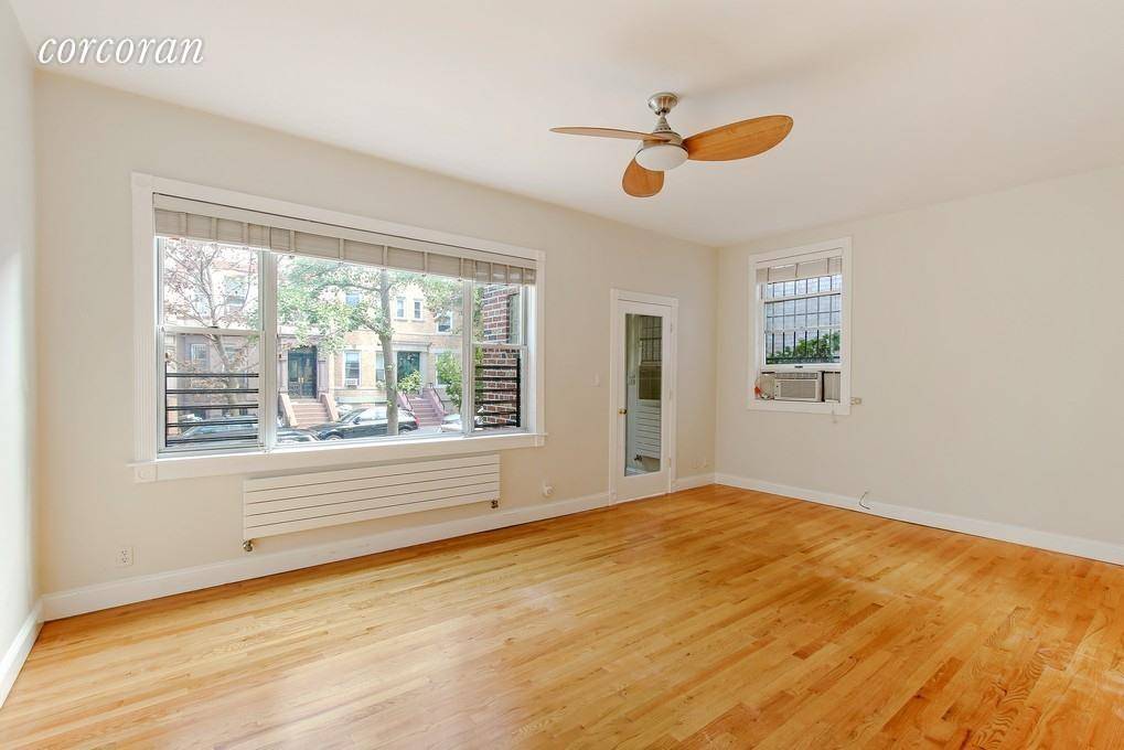 PARKING INCLUDED ! ! ! Gorgeous three bedroom duplex apartment with HUGE PRIVATE GARDEN on 2nd Street in Park Slope !