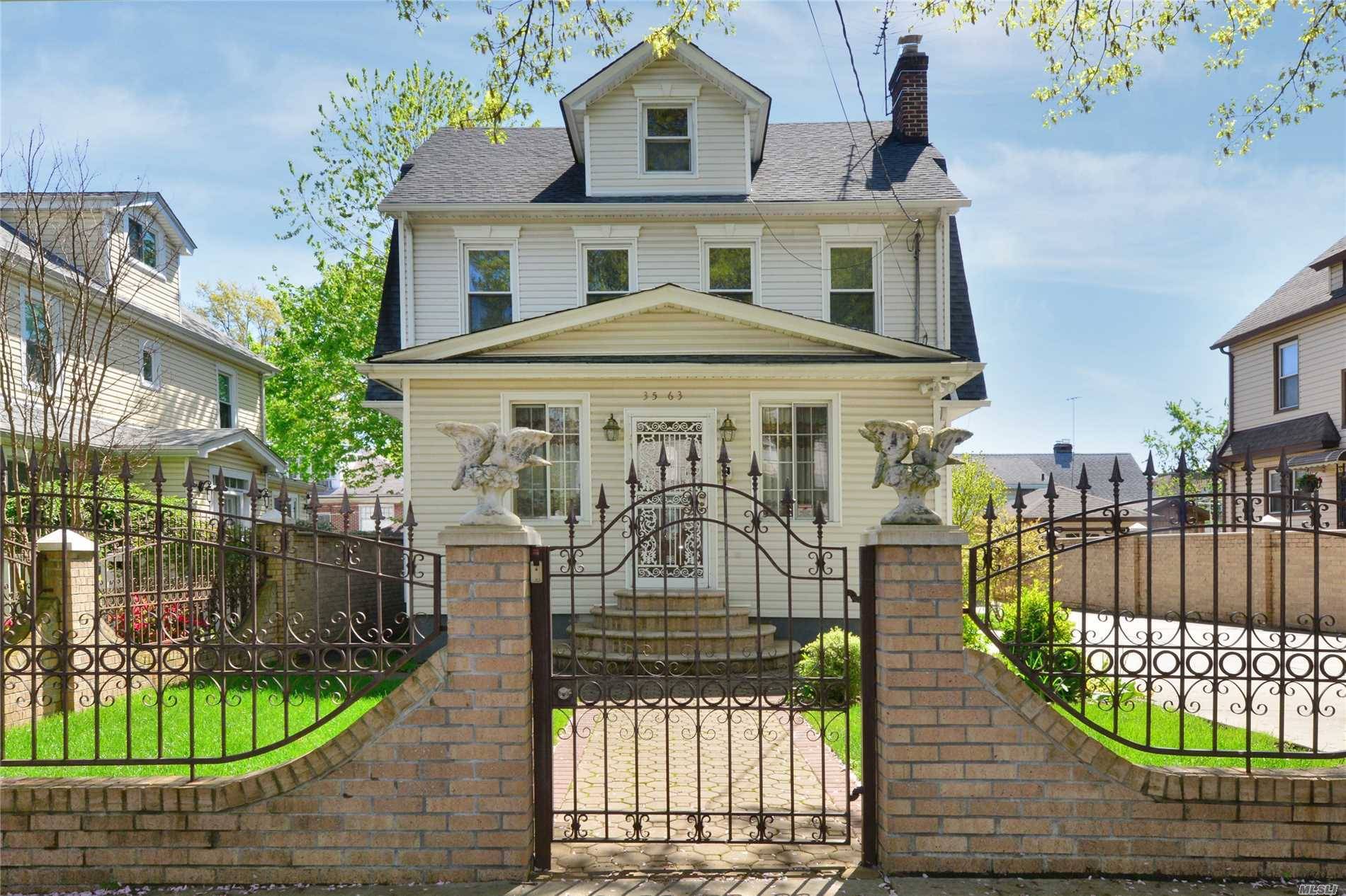 Spacious 5 Bedroom, 2 Full Bath Detached Colonial located on Quiet Treelined Street in the Heart of Prime North Flushing.