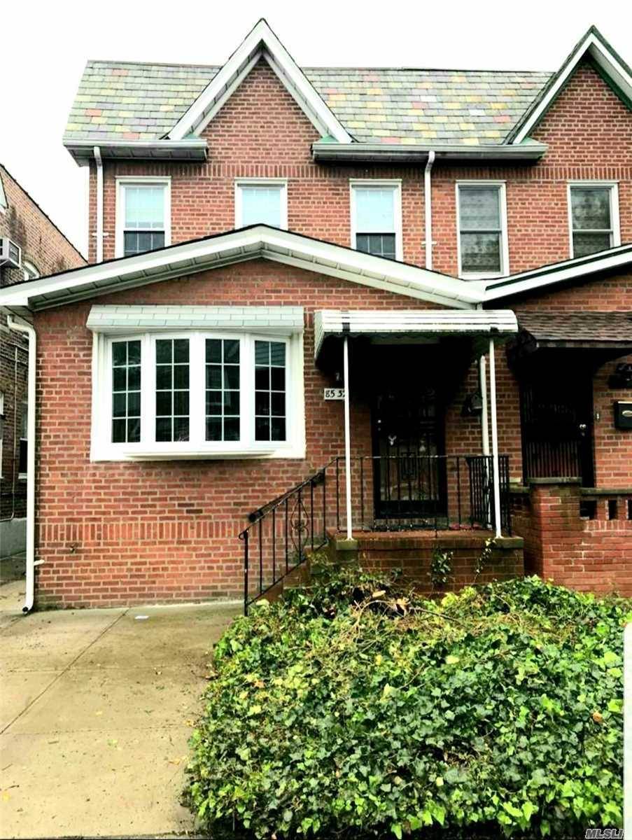 Semi Detached Brick Home In The Desirable Area Of Rego Park.