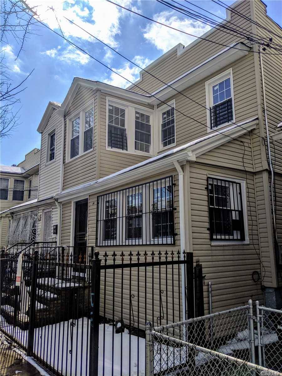 Completely Newly Renovated 2 Family Semi Attached with private 2 Car Parking Additional 2 Car Garage, Walking Distance to the Subway in Prime Woodhaven Neighborhood !