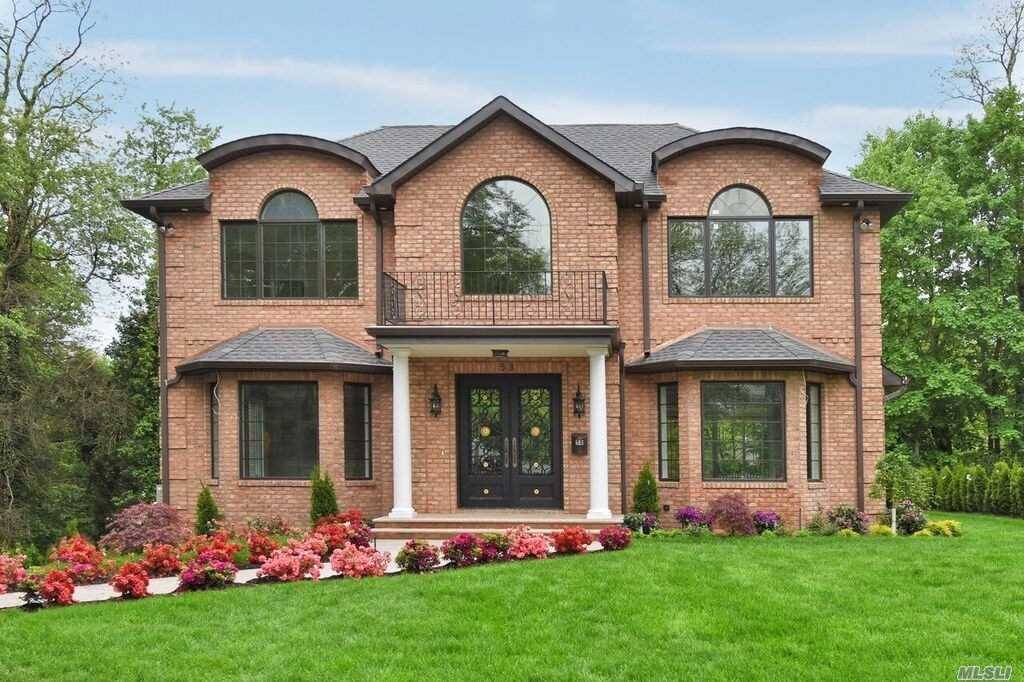 Gracious All Brick Center Hall Colonial With Grand Entry And High Ceiling.