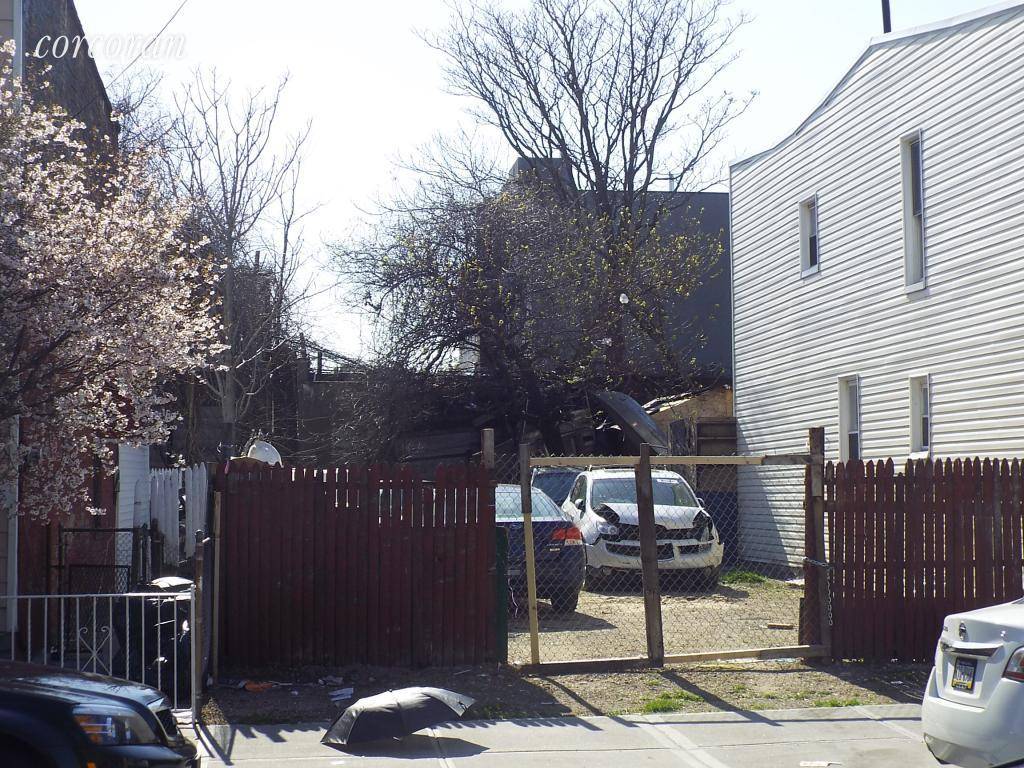 This property is a development site in East New York with a lot size of 25 x 100.