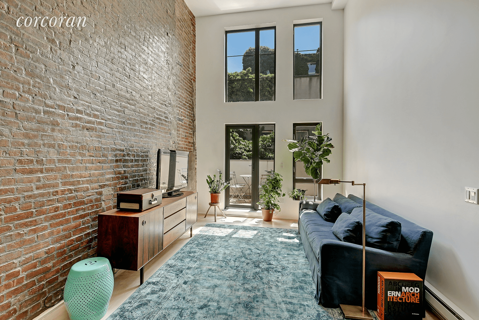Welcome home to an incredible duplex loft apartment with a private TERRACE in south Williamsburg.