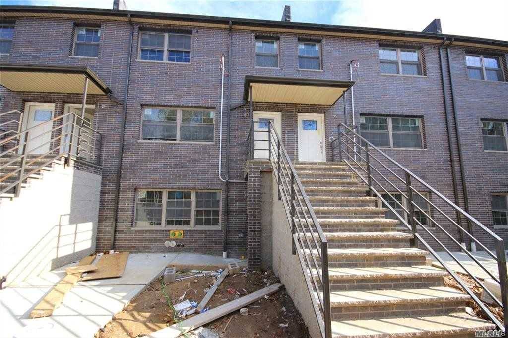 Move into this humongous and luxurious new construction 2 family attached brick home with a private driveway.