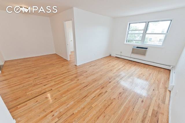 SERIOUSLY SPACIOUS three bedroom, two bathroom apartment on the third floor of a multi family building.