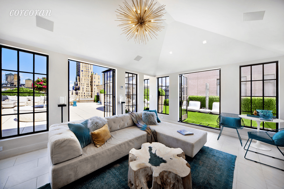 This luxurious ten room duplex penthouse rests on one of the most prestigious white glove pre war limestone co ops Manhattan has to offer.