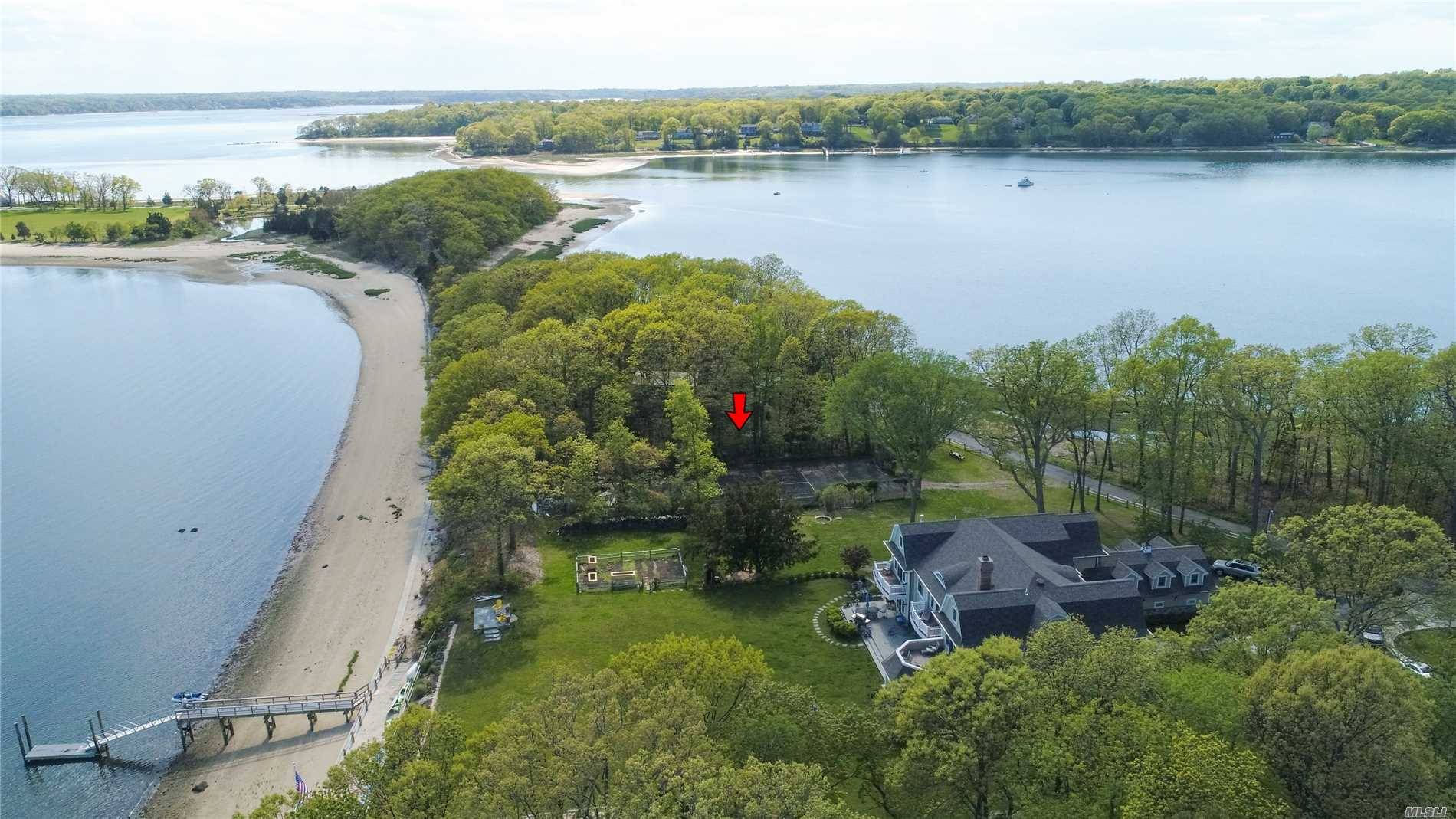 Build your dream home on this spectacular waterfront lot on exclusive Duck Island in Asharoken.