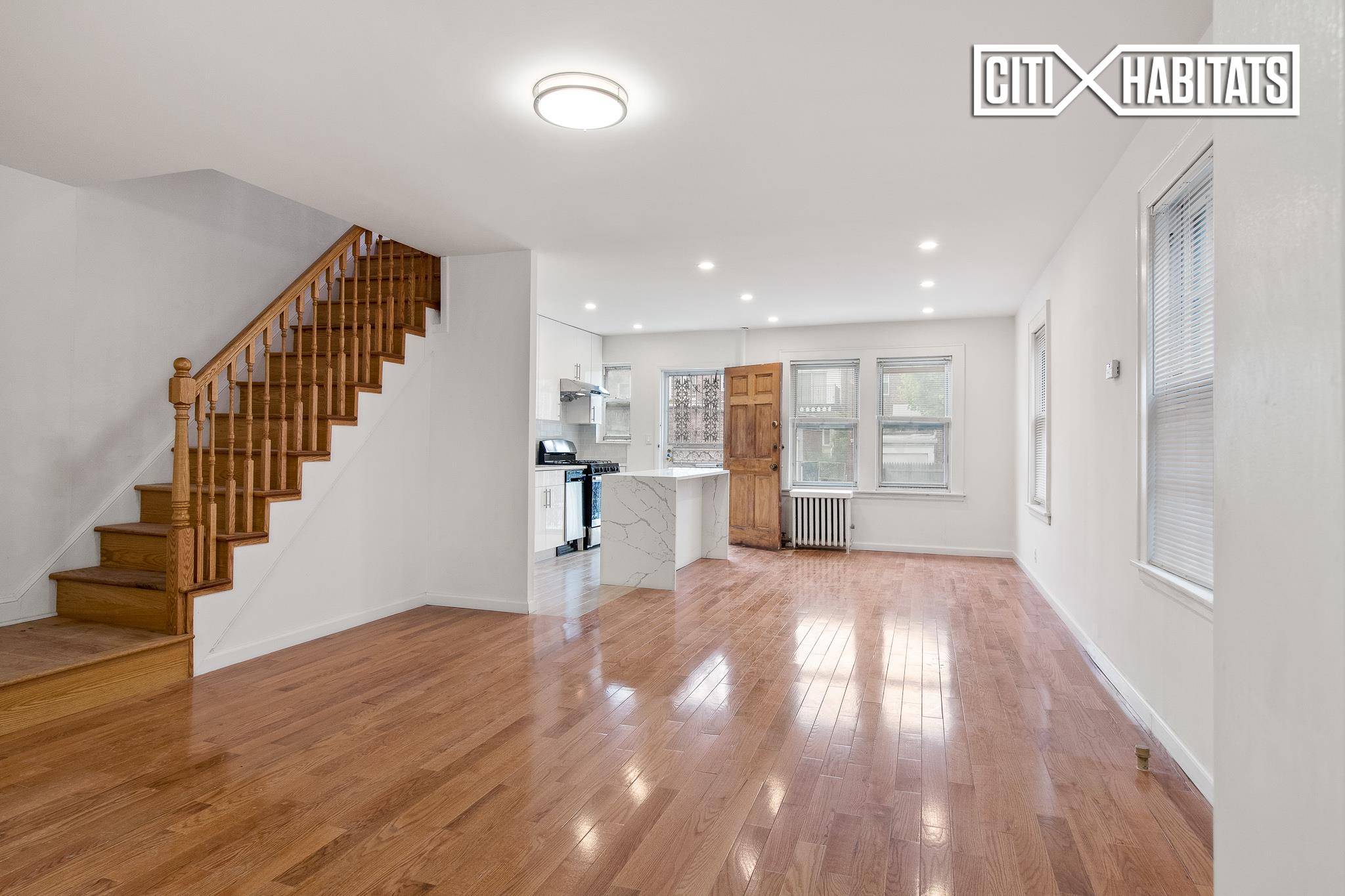 Brand new, gut renovated and sprawling three bedroom three bathroom house with separate exit and entrance in the basement in vibrant Forest Hills neighborhood !