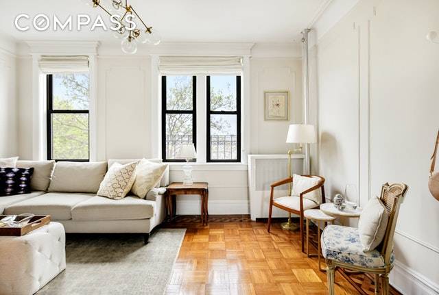 On one of the most beautiful avenues in Park Slope and just one block up the hill to the park, is a charming to the nines prewar two bedroom, one ...