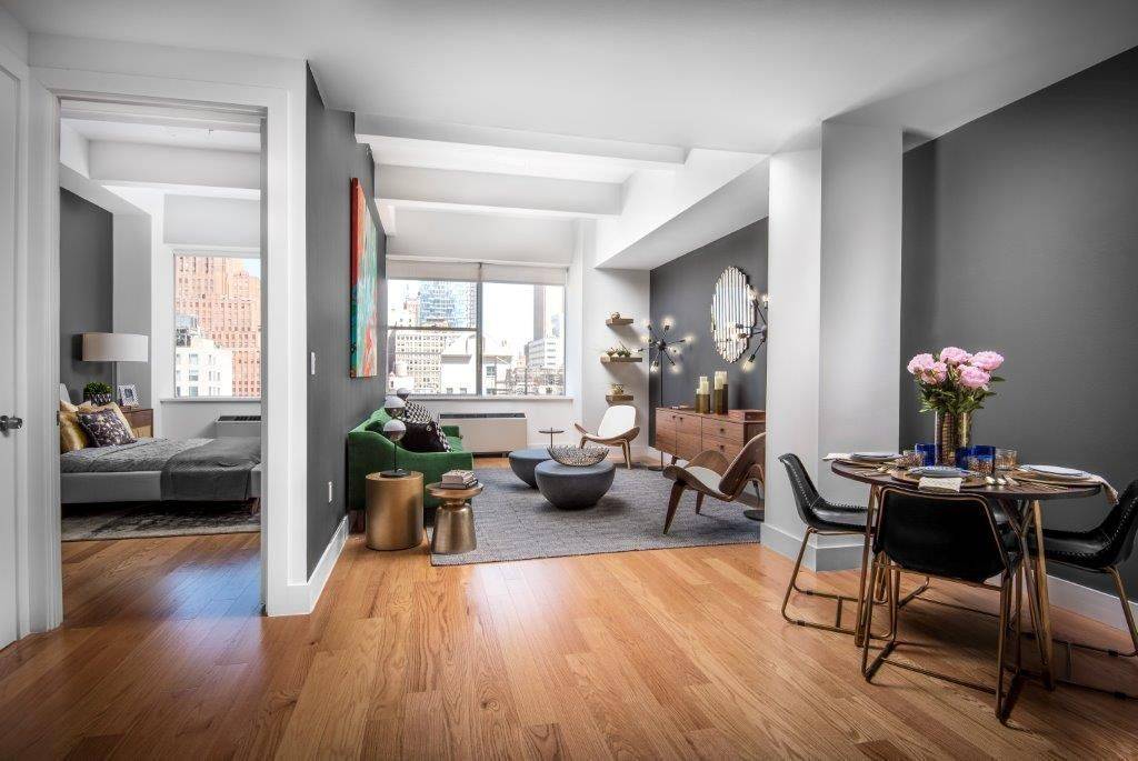 Huge 2 Bedroom / 2 Bathroom with Soaring High Beamed Ceilings, Large Windows, Plank Flooring and an Open Concept throughout, Situated in Tribeca