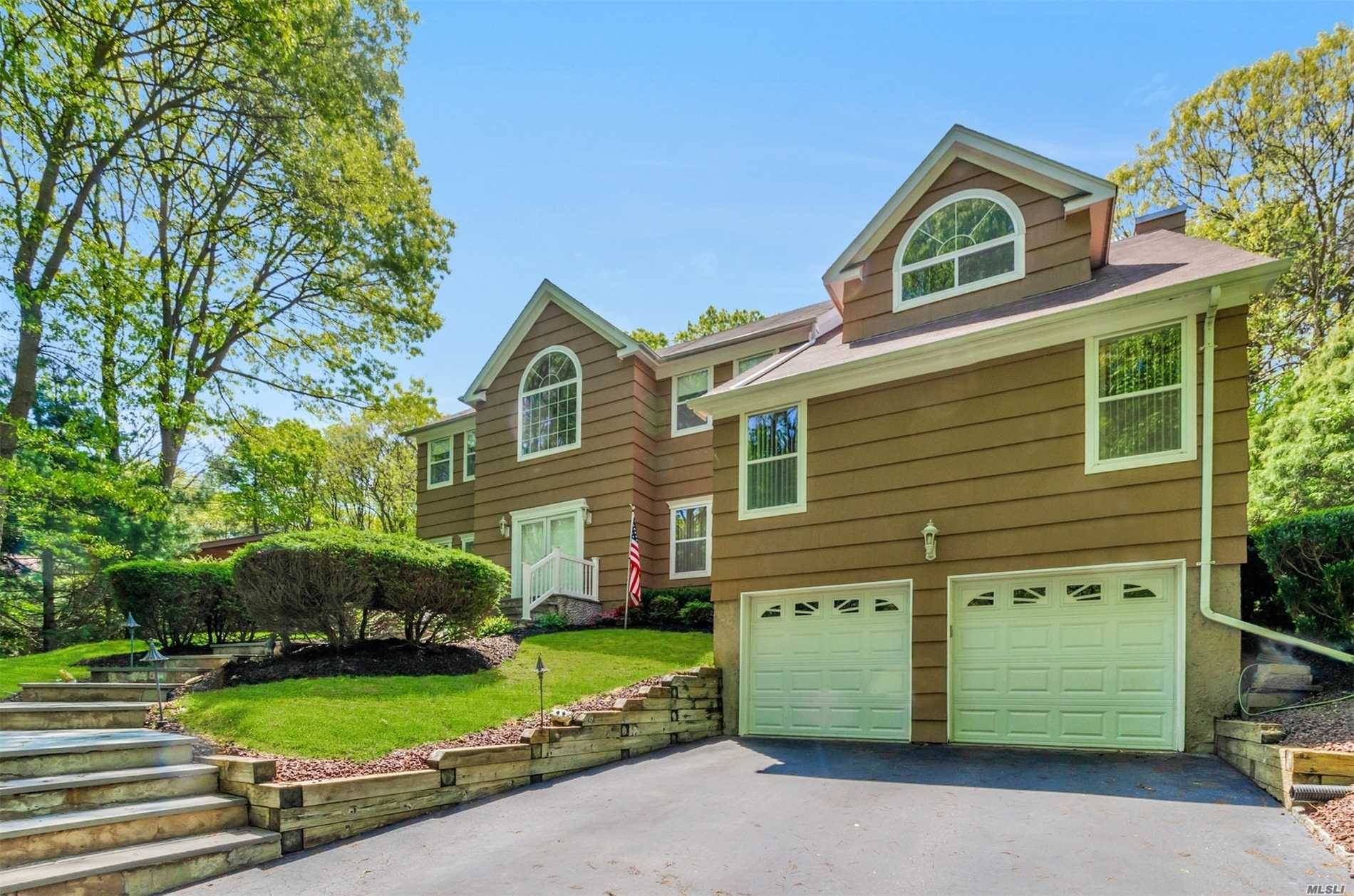 Magnificent newer built Colonial in Smithtown Pines Entry foyer expanded blacktop driveway w Cobblestone border Grande double door entry 9 ft ceilings incredible open floor plan hrdwd flrs Beautiful kit ...