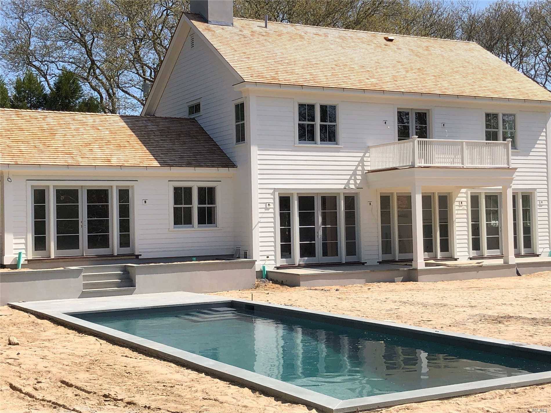 Incredible New Construction in East Hampton Village The 4600 SqFt house has 7 bedrooms, 5.