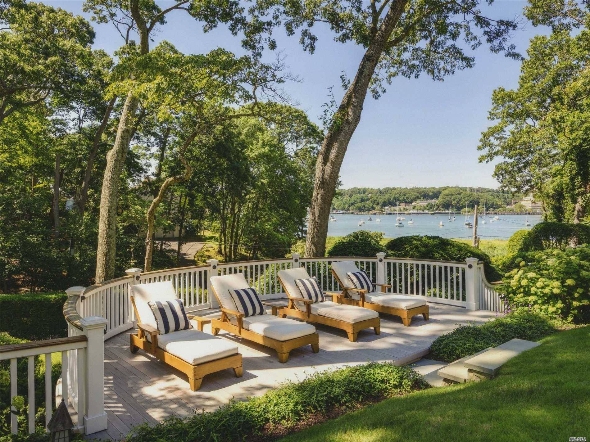 Sitting Steadfastly In One Of The North Shore's Most Exclusive Neighborhoods, Is A Sophisticated, Sun Drenched, Water View Nantucket Style Estate Surrounded By An Award Winning Pool Retreat And Landscape ...