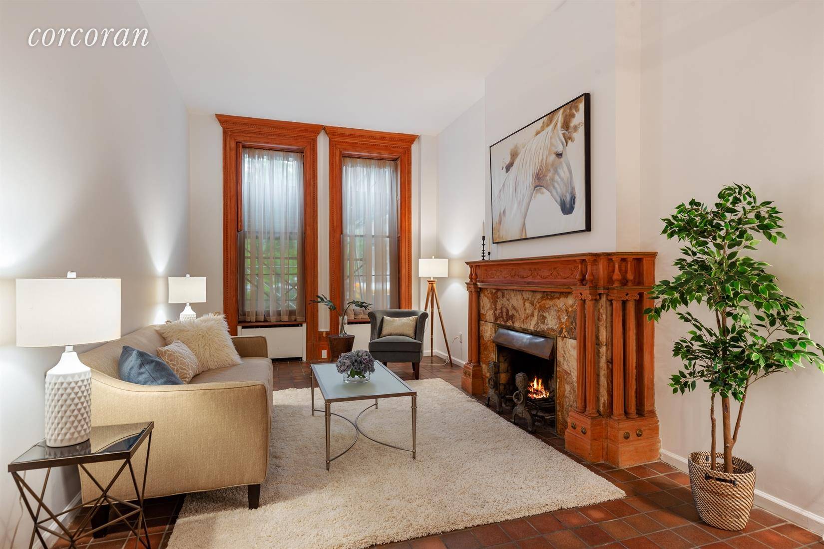 This beautifully maintained three bedroom apartment with private outdoor space, a designated den, and a home office, is the epitome of Manhattan charm.