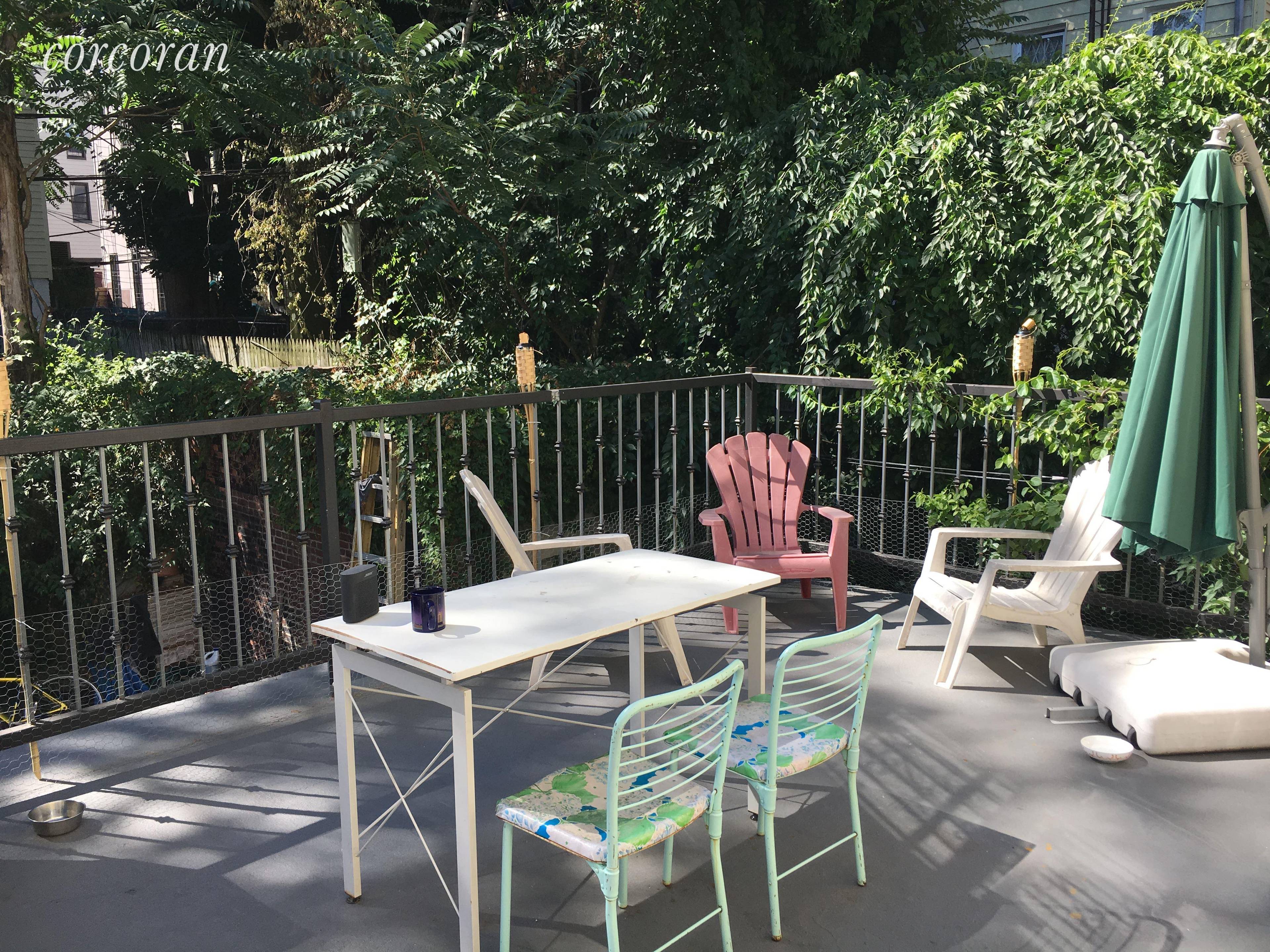 No Fee Bushwick two bedroom, 1 bath apartment with high ceilings, hardwood floors and back deck just in time for the summer.
