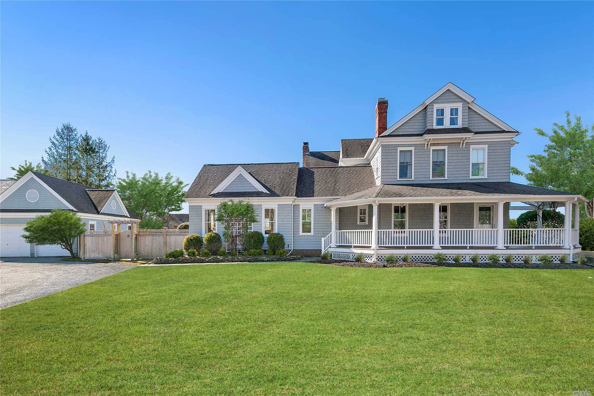 This magnificent three story traditional home is quintessential Quogue.