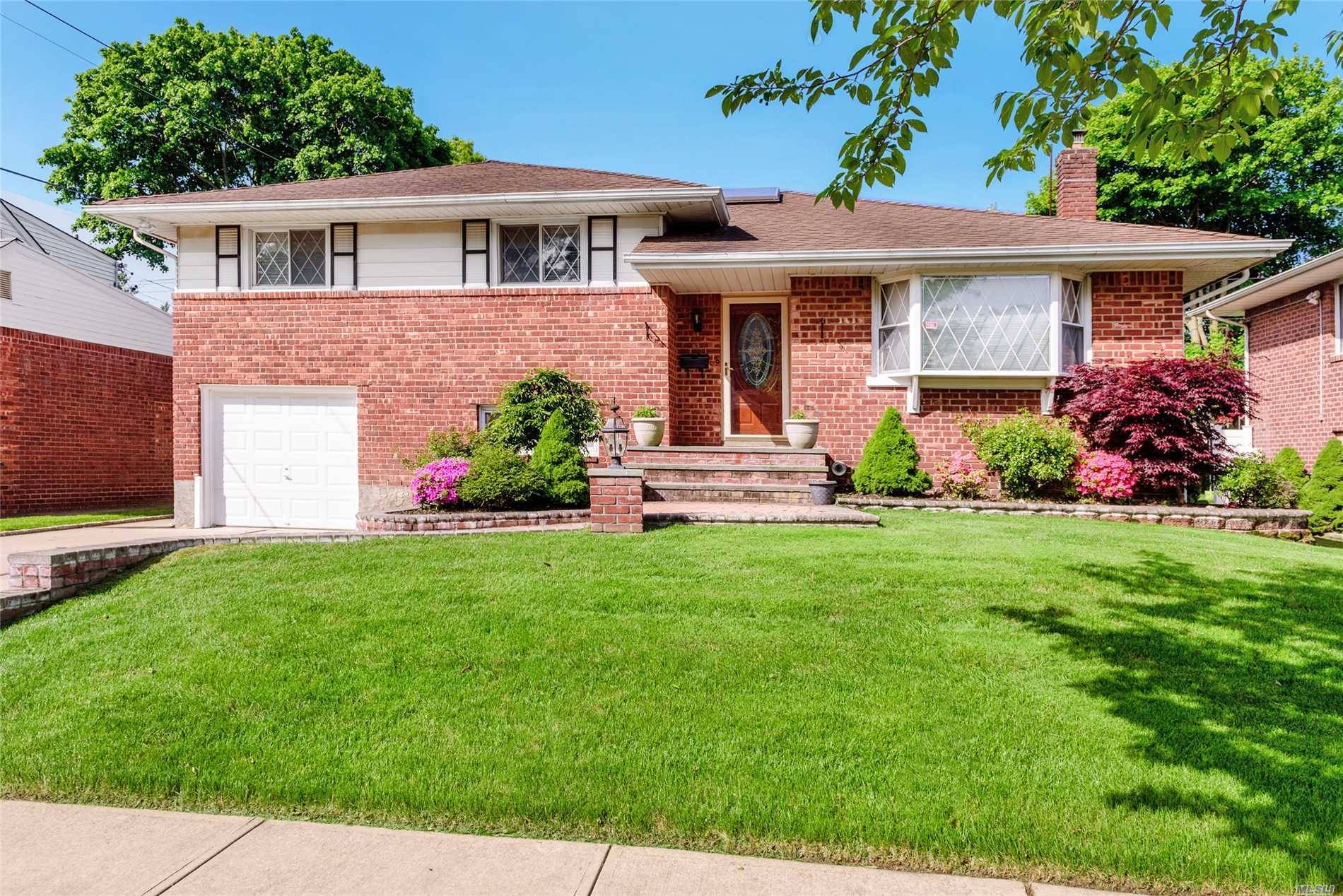 This Spacious Renovated Large 4 Level Split Brick Home Features 4 Bedrooms and 3 Baths, Marble Entry Foyer, Updated Kitchen With Gas Cooking, Skylight, New Bath, Cedar Closet, Lovey and ...