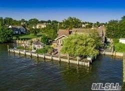Spectacular Riverfront Location with Incredible Views, Lots of bulkheading with boatslip, Large home, 2 Dens, Beautiful Masonry, Views of the Bay, and your own Gazebo to sit and enjoy the ...