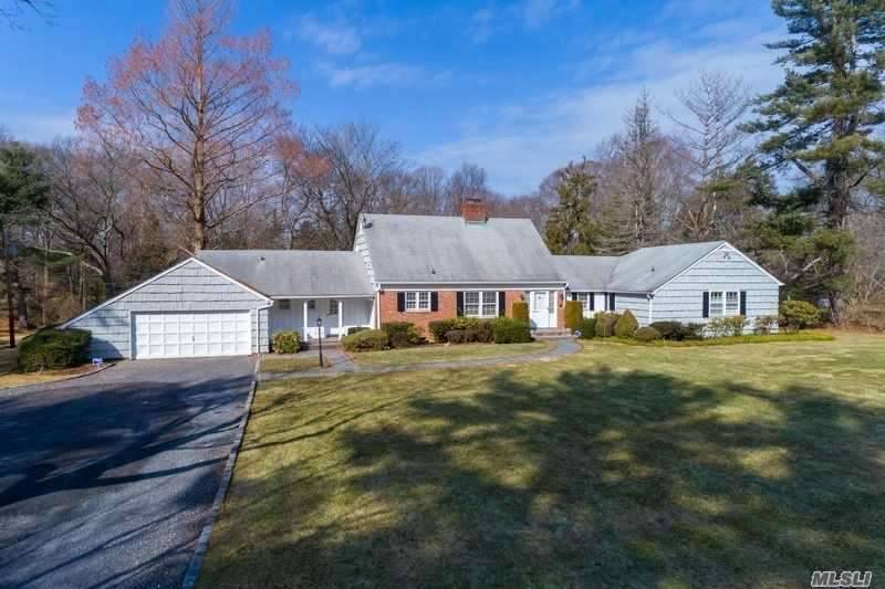 Value ! Totally renovated and pristine expanded ranch on two usable parklike acres.